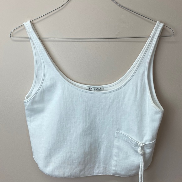 Zara Tops - - Zara size small white cropped top with front pocket. Machine washable.